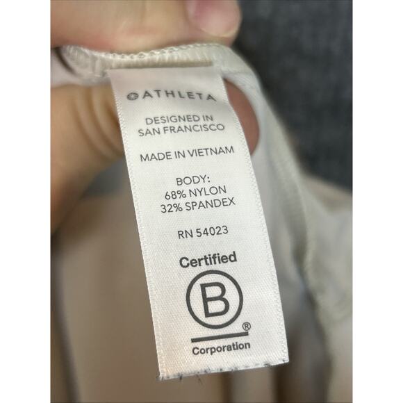 Athleta Womens Cosmic Skirt Medium Tan Stretch Performance Pockets Golf Tennis - Picture 7 of 7